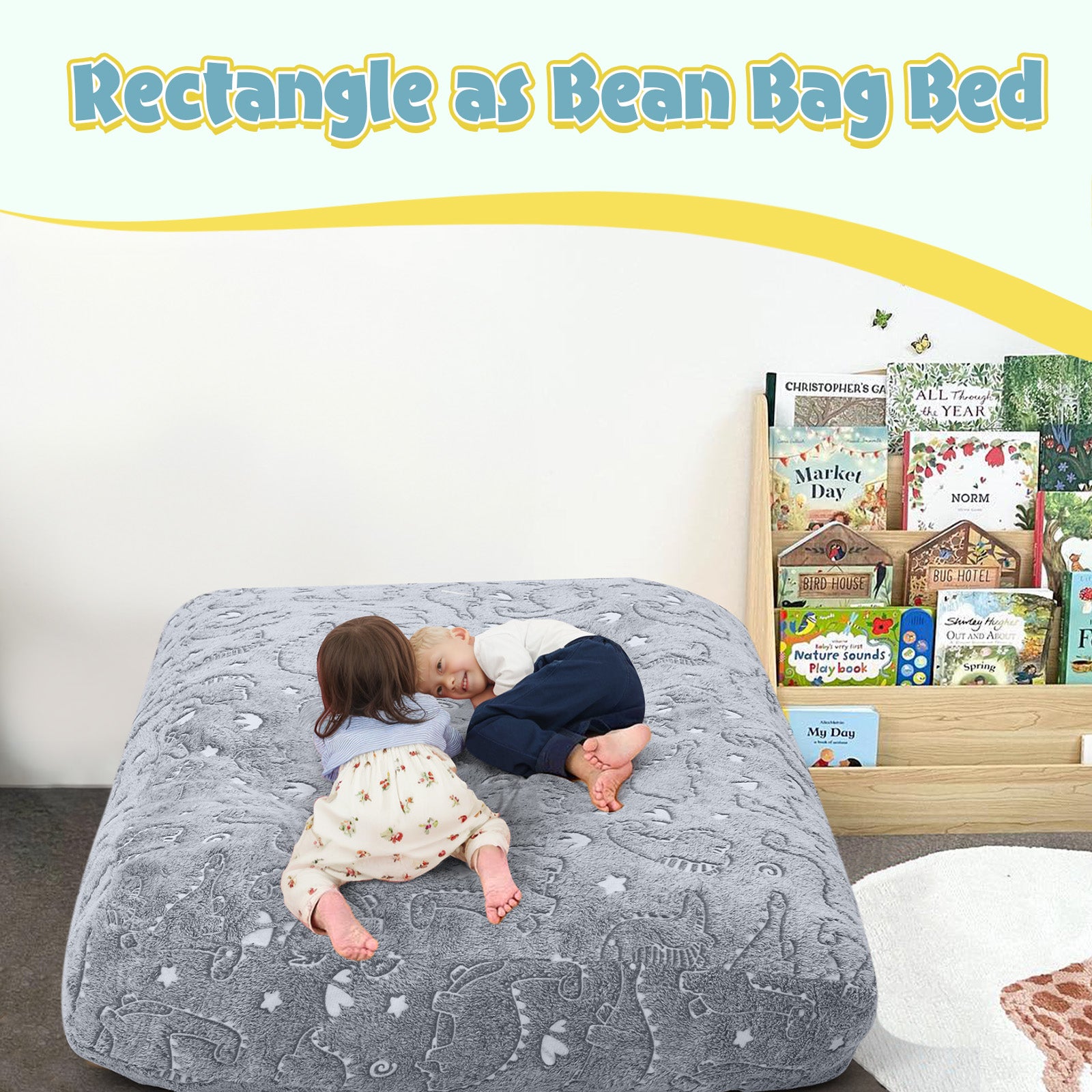Two kids lying on Comax's Glowing Dinosaurs Bean Bag Bed for kids