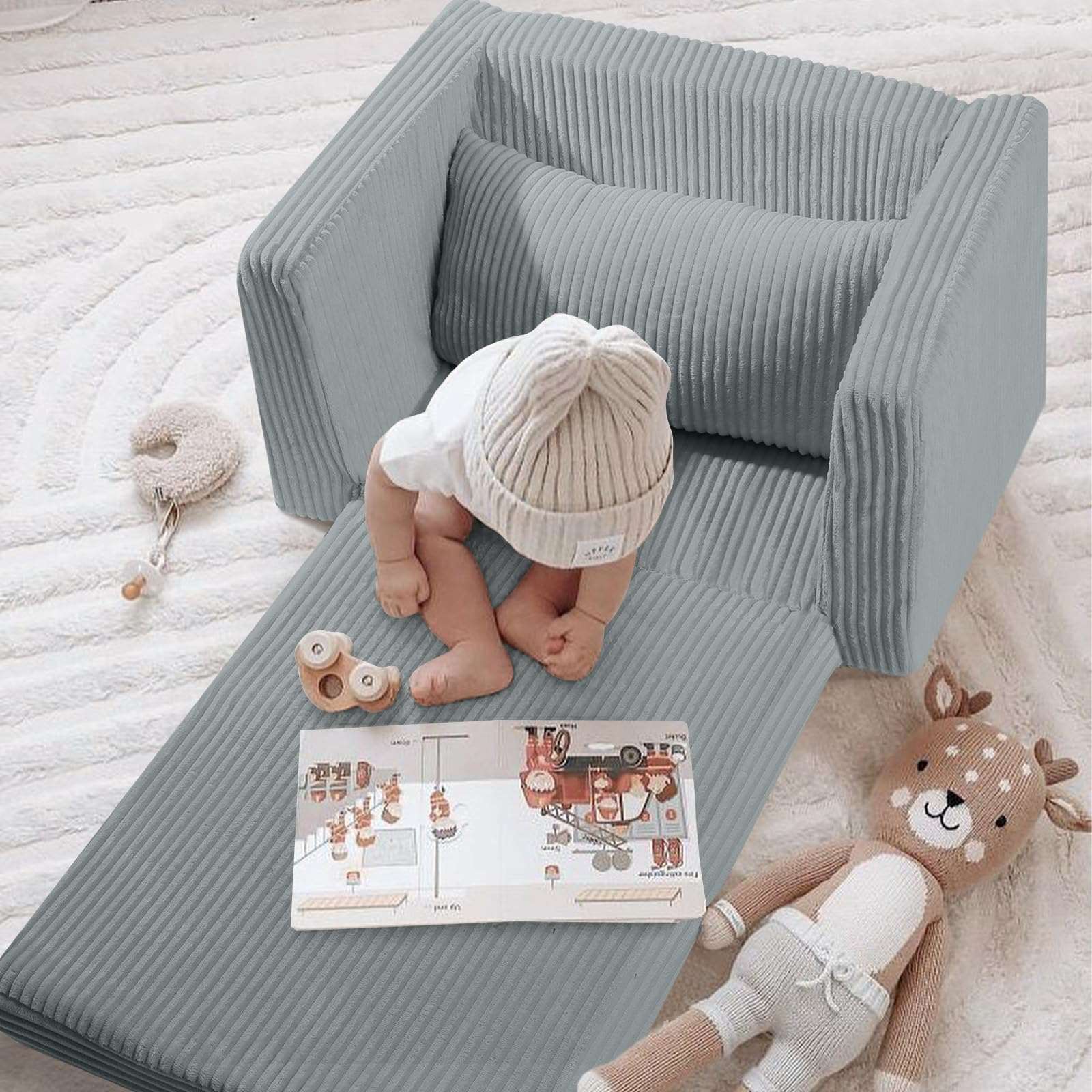 Baby sitting and playing on Glowsofa's Grey Children's Fold Out Sofa