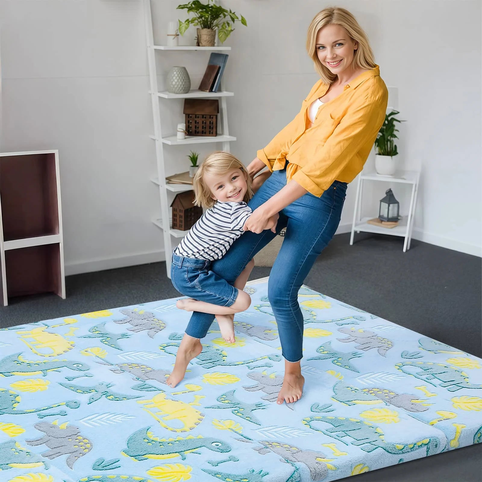 Girl and mom playing at Blue Dinosaur Glow Foam Baby Play Mat