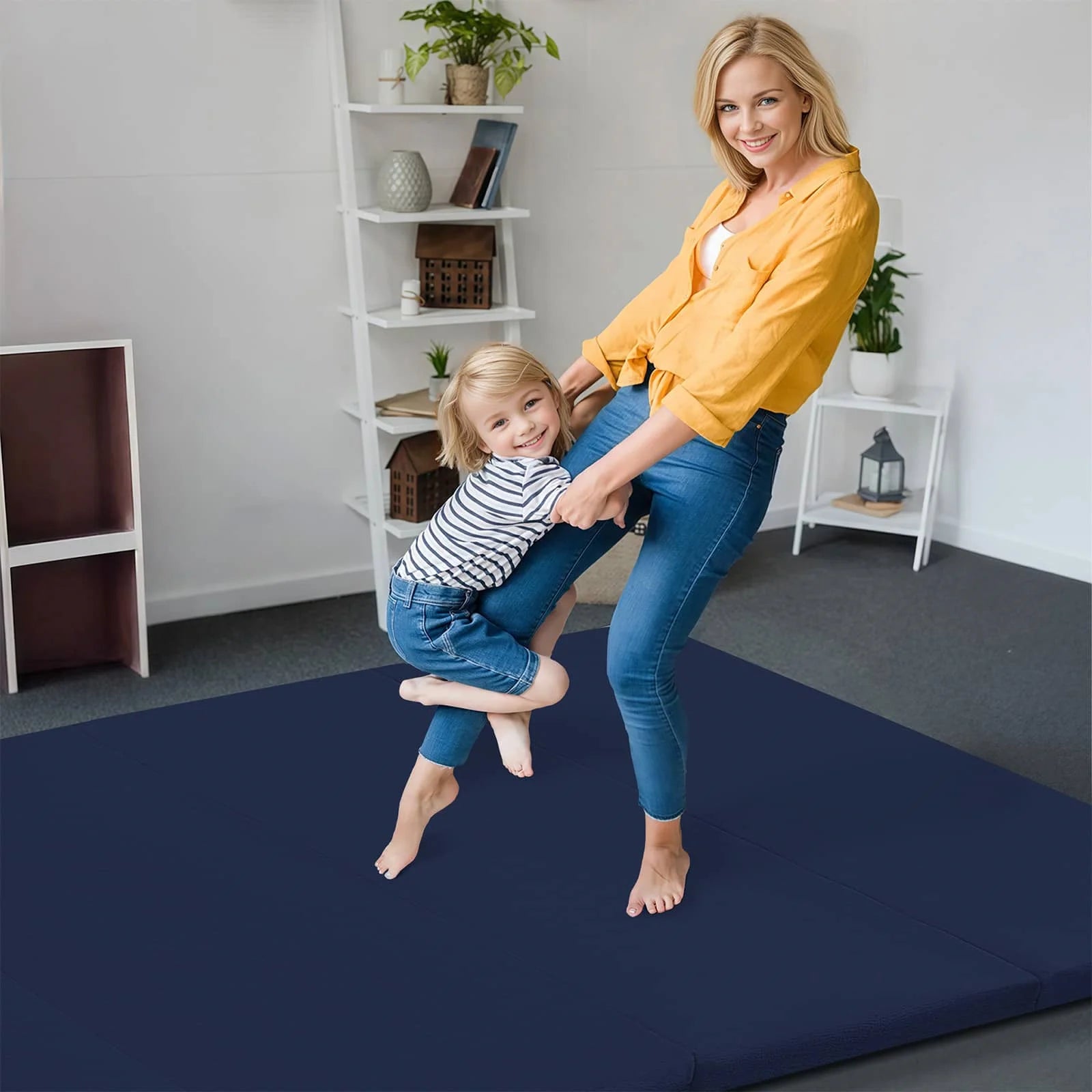 Girl and mom playing at Navy Glow Foam Baby Play Mat
