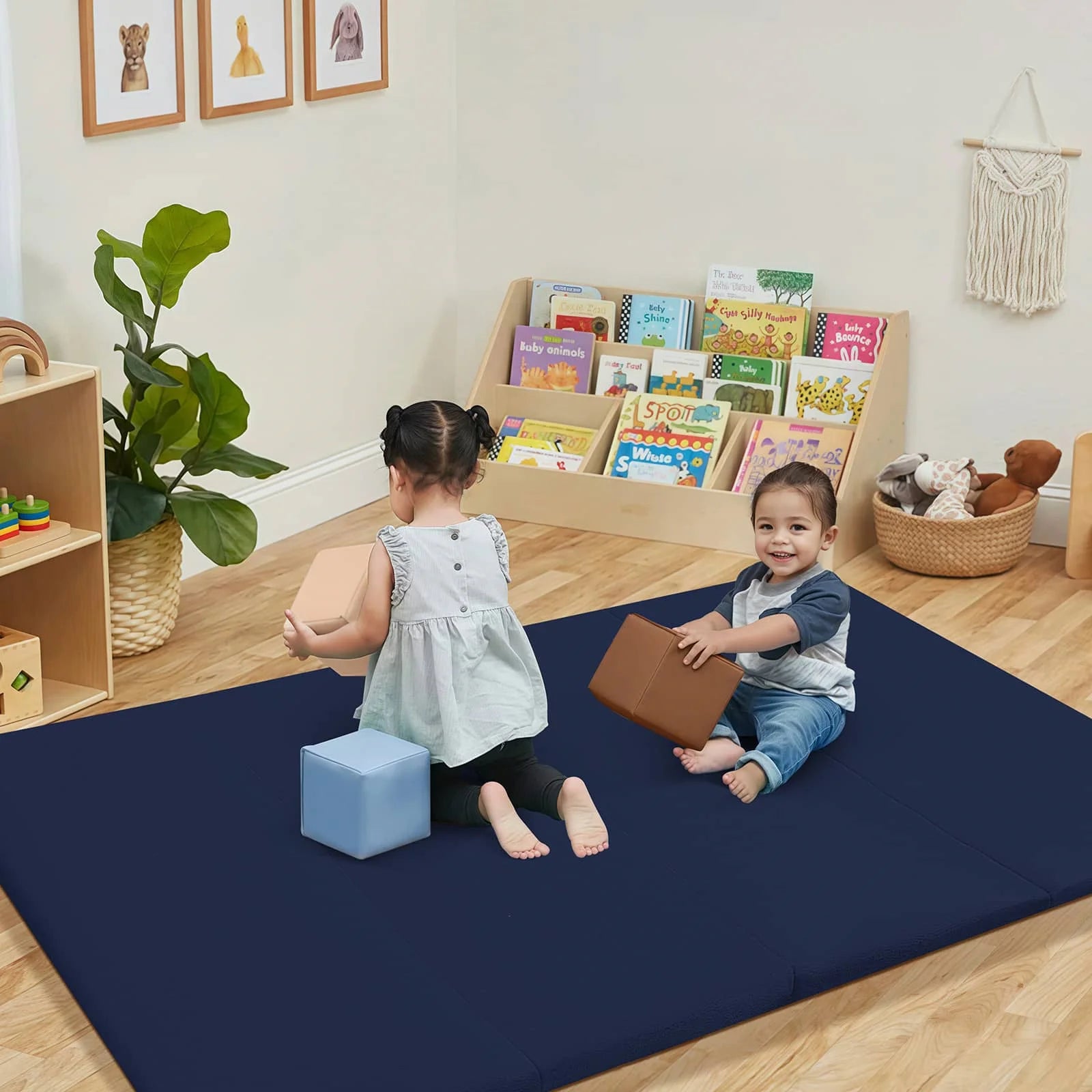 Two girl playing on Navy Glow Foam Baby Play Mat