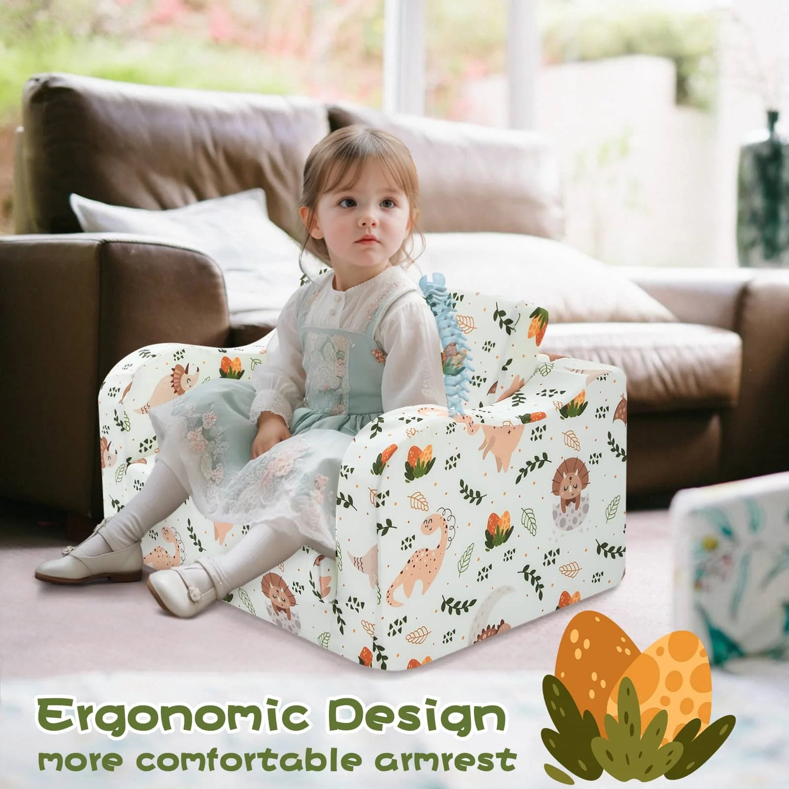Girl sitting on Glowsofa's children's couch chair with Dinosaur patterns with armrests
