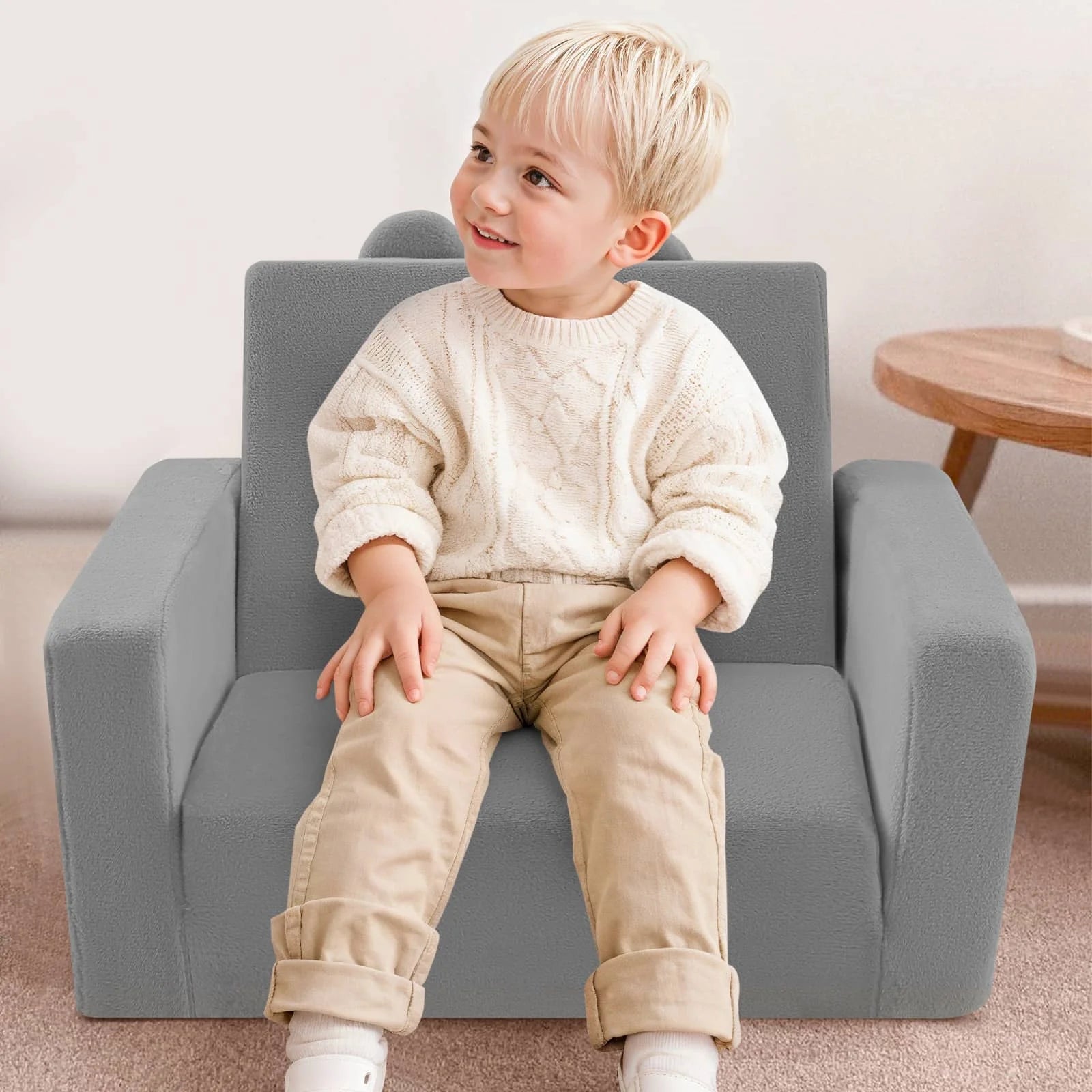 Boy sitting in Children's fold out sofa-Grey