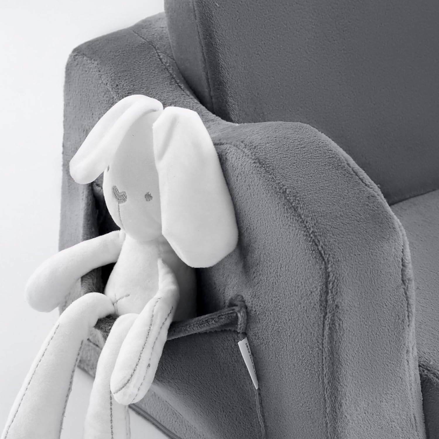 Glowsofa's Grey Children's Fold Out Sofa features pockets on the sides.