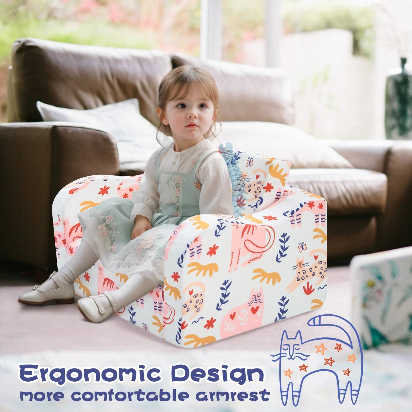 Girl sitting on Glowsofa's children's couch chair with Cat patterns with armrests 