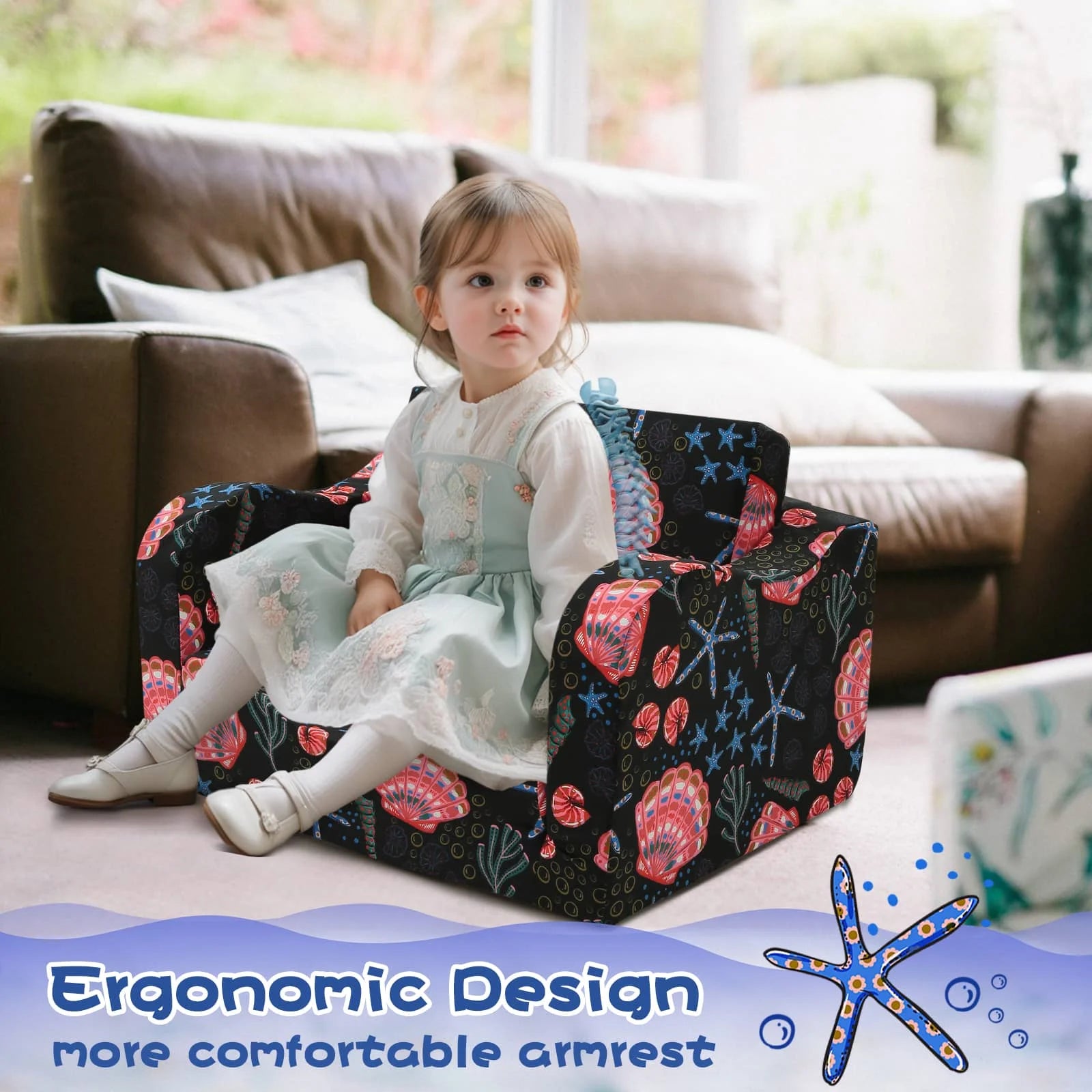 Girl sitting on Glowsofa's children's couch chair with Seashell patterns with armrests 