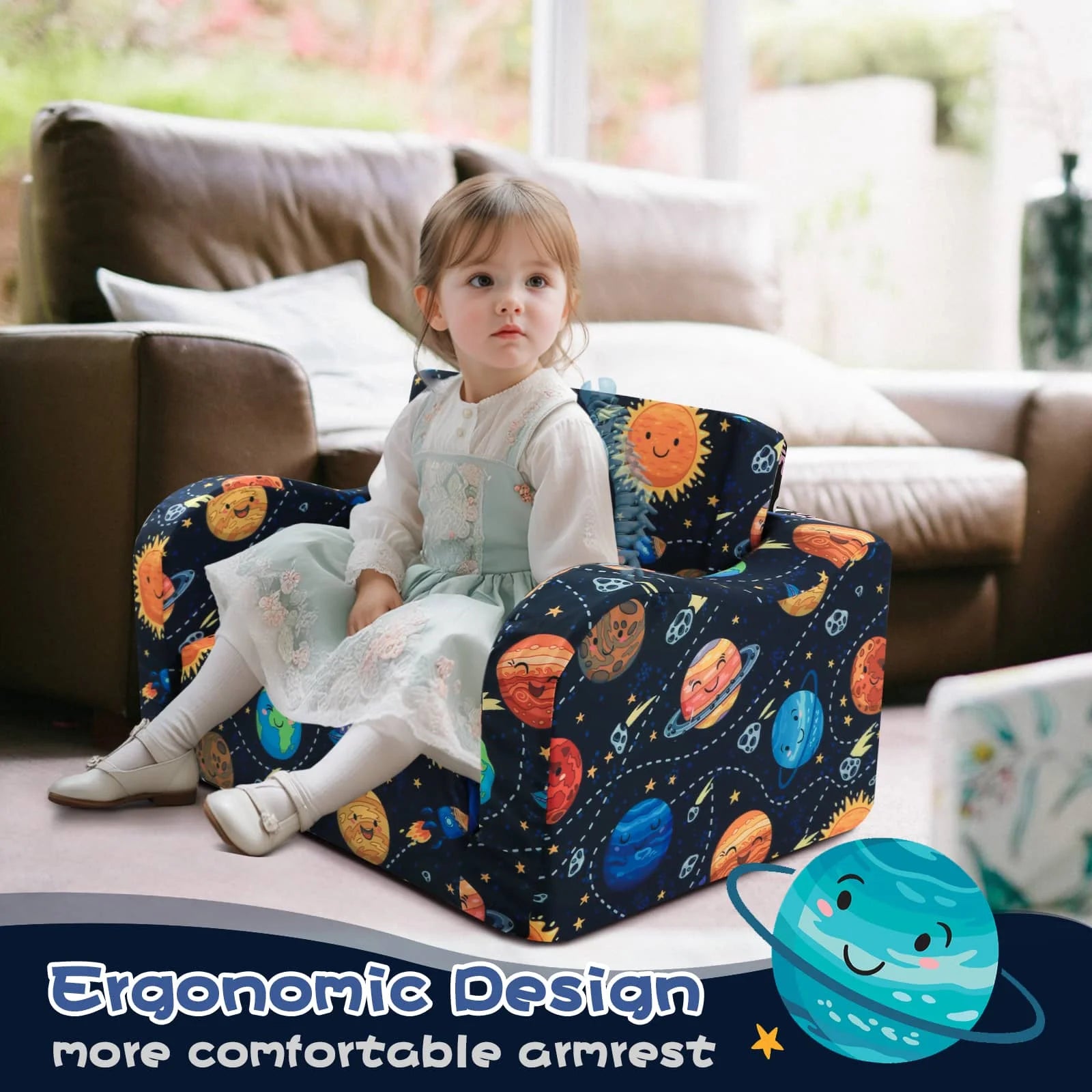 Girl sitting on Glowsofa's children's couch chair with Astronaut patterns with armrests 