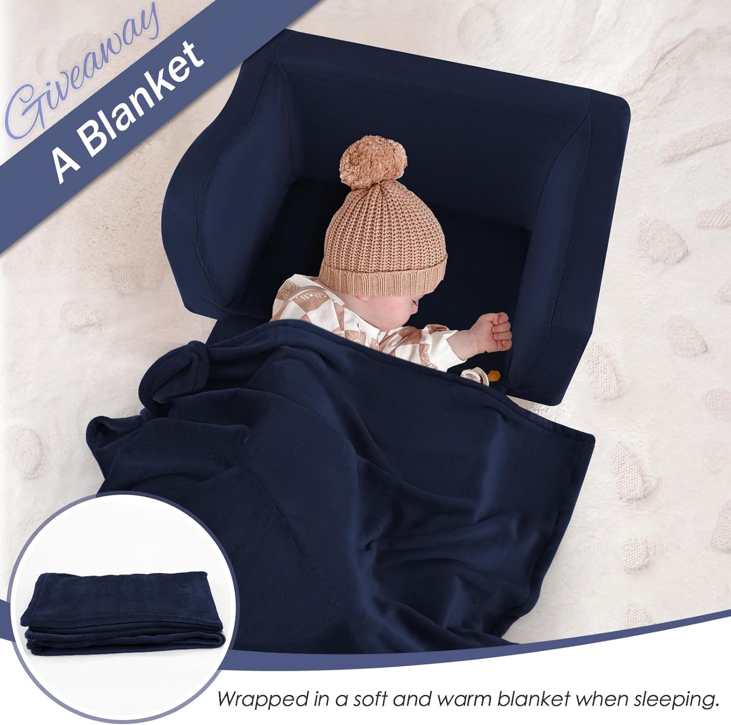Baby sleeps under a blanket on Glowsofa's Navy Children's Fold Out Sofa