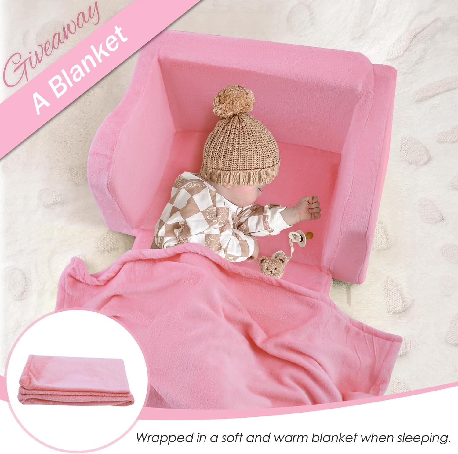 Baby sleeps under a blanket on Glowsofa's Pink Children's Fold Out Sofa